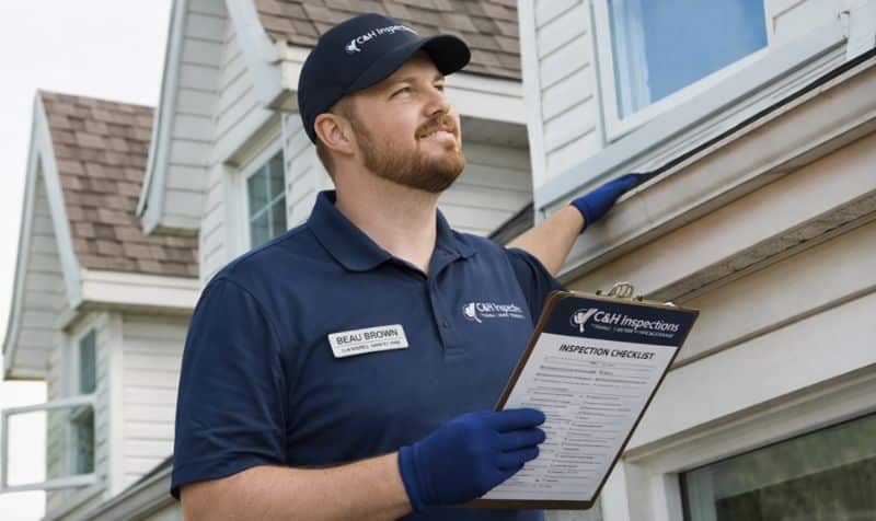 Professional home inspector examining a property in Salt Lake City, Utah
